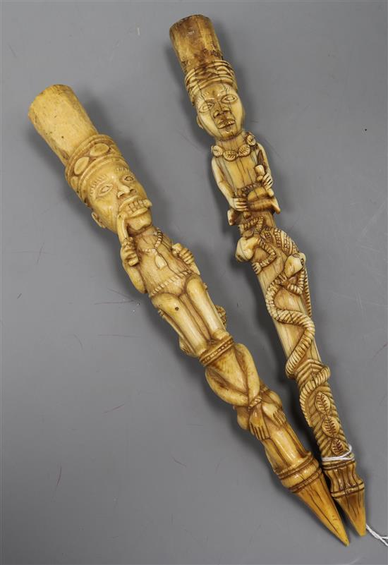 Two West African ivory ceremonial tusk carvings, late 19th century/early 20th century Length 28cm